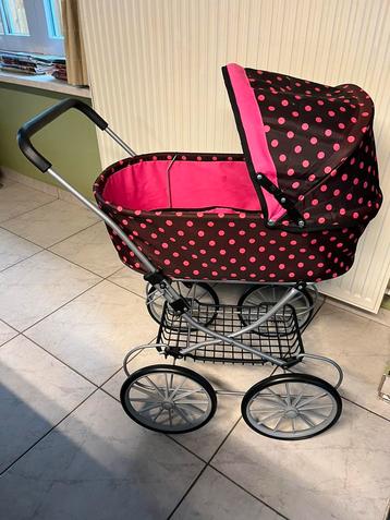 Luxe poppenwagen met roze stippen  beschikbaar voor biedingen