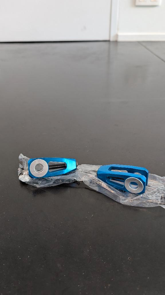 Kettingspanner Dax CNC Blauw Nieuw, Fietsen en Brommers, Brommeronderdelen | Algemeen, Nieuw, Overige typen, Ophalen of Verzenden