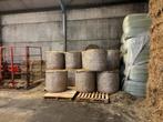 Ronde balen hooi te koop