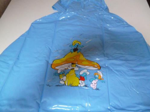 Kinderponcho met smurfen motief, Kinderen en Baby's, Kinderkleding | Maat 140, Zo goed als nieuw, Meisje, Jas, Ophalen of Verzenden