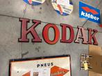 KODAK plastic letters van op gevel, Ophalen