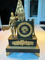 Bronzen vergulde klok, Ophalen