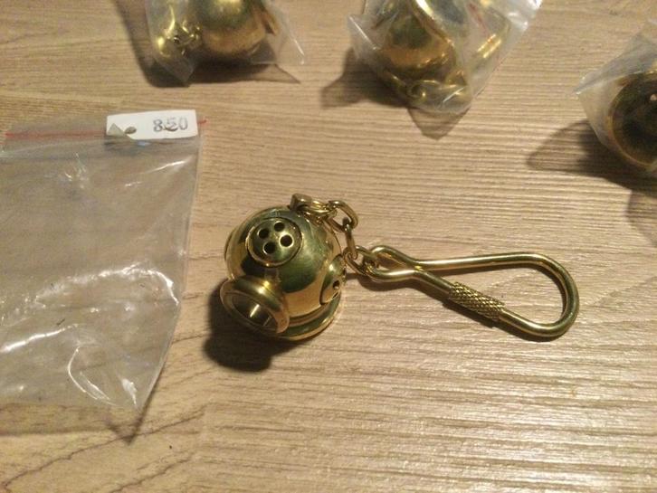 Sleutelhanger duikhelm nieuw aan 8,50€/stuk - Ecocheques, Watersport en Boten, Duiken, Nieuw, Overige typen, Ophalen of Verzenden