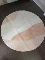 Ronde tapijt, Ophalen