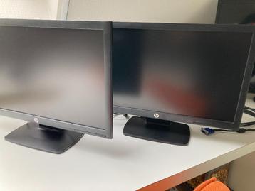 2 computerschermen en docking station HP beschikbaar voor biedingen