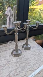 2 kandelaars in tin, Ophalen