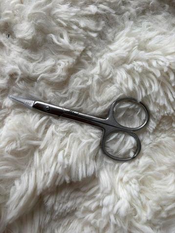 abstract nagelriemknipper beschikbaar voor biedingen