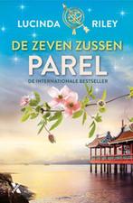 Te Koop Boek De zeven zussen 4 - Parel  Lucinda Riley, Boeken, Romans, Europa overig, Lucinda Riley, Ophalen of Verzenden, Zo goed als nieuw