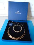 SWAROVSKI Collier en Armband in Bladgoud nieuw met doos., Neuf, Enlèvement ou Envoi, Or, Or