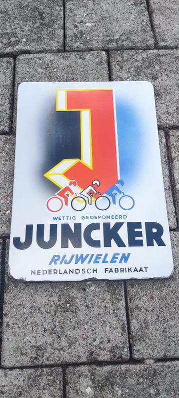Emaille bord Juncker rijwielen beschikbaar voor biedingen