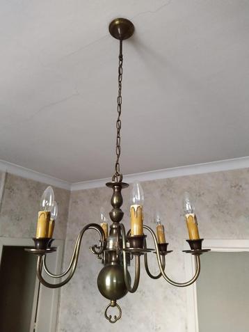 Oude koperen luster beschikbaar voor biedingen