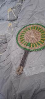 geweven afrikaanse waaier, Ophalen