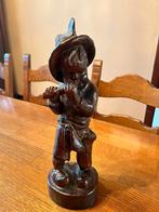 Houten beeldje, Ophalen