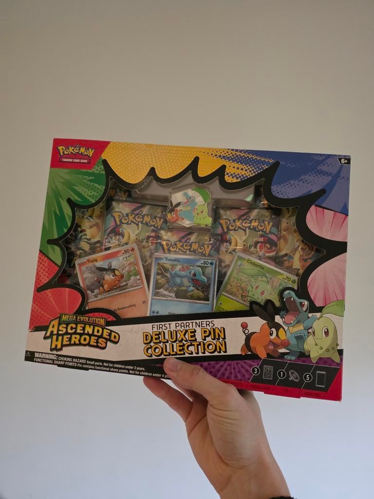 pokemon first partners deluxe pin collection, Ophalen of Verzenden, Booster