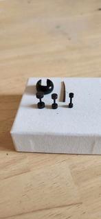 4 piercings zwart, Ophalen