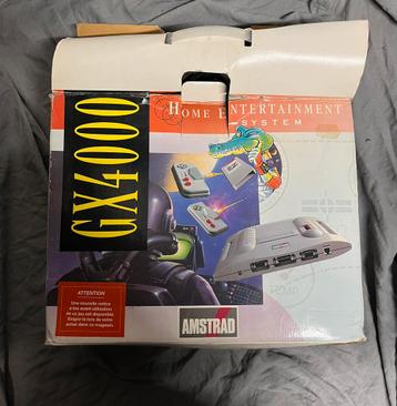 Amstrad GX4000 in doos met 2 spelletjes beschikbaar voor biedingen