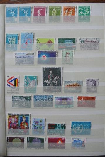Luxemburgse postzegels (alb2) in een album (n133)