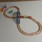 Houten spoorweg met trein., Ophalen