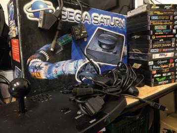 Sega Saturn met doos en 17 games 2 controllers 1 joystick