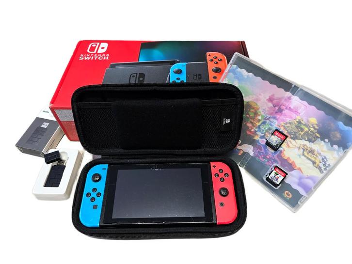 Nintendo Switch + 2 spellen, Games en Spelcomputers, Games | Nintendo Switch, Gebruikt, 3 spelers of meer, Vanaf 7 jaar, Online