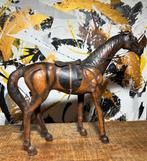 antiek lederen paard, Ophalen
