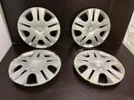 4 Nissan Micra 14" wieldoppen, Ophalen of Verzenden, Gebruikt