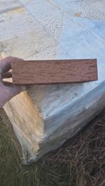 Gevelstenen met boomschors motief, Ophalen