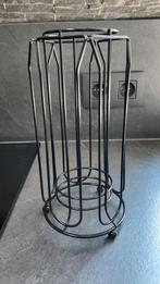 Koffiecupshouder, Enlèvement