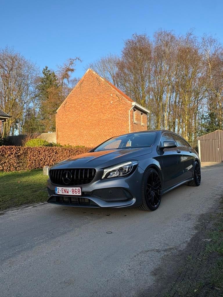Mercedes CLA 180 AMG line, Auto's, CLA, Leder en Stof, 1595 cc, 5 deurs