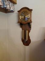 AMS wandklok met slinger massief eik, Enlèvement