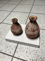 Twee vaasjes in aardewerk, Ophalen