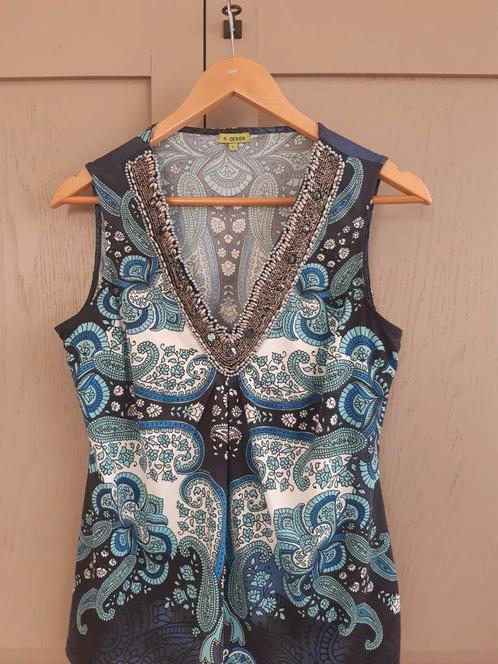Topje " K Design" Maat Large., Kleding | Dames, Topjes, Zo goed als nieuw, Maat 42/44 (L), Blauw, Zonder mouw, Ophalen of Verzenden