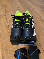 Pakket voetbal: schoenen, scheenbeschermers, kousen, Ophalen