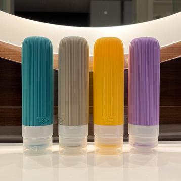 Lekvrije reisflacons met etui beschikbaar voor biedingen