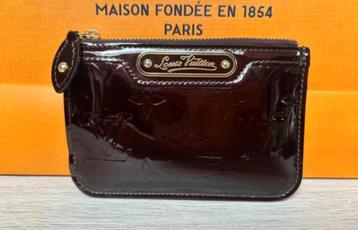 Louis vuitton key pouch beschikbaar voor biedingen