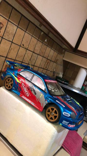 RC Tamiya Subaru Rally STI TB-01 Vintage “99” disponible aux enchères