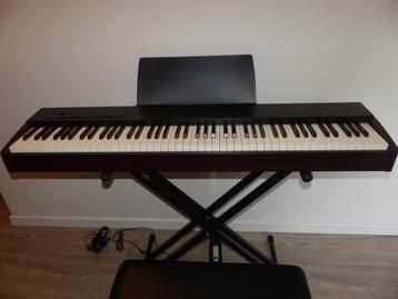 ROLAND F-20 DIGITALE PIANO met accessoires  beschikbaar voor biedingen