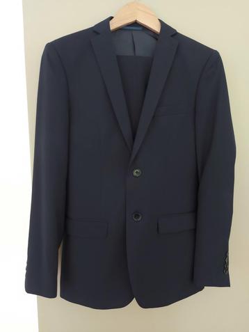 Costume bleu foncé WE - Taille 42 - Slim fit - État neuf :)