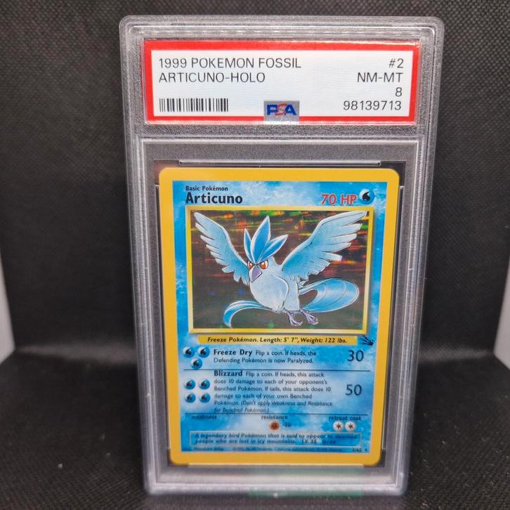 Articuno Holo Fossil PSA 8, Hobby en Vrije tijd, Verzamelkaartspellen | Pokémon, Zo goed als nieuw, Ophalen of Verzenden