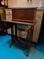 Oude singer naaimachine, Enlèvement