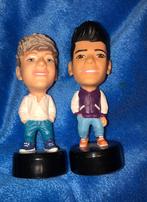 2 figurines One Direction