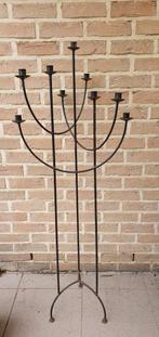 Smeedijzeren kandelaar, Ophalen