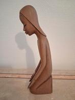 Houten beeld, Ophalen