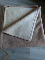 100% wollen deken, Ophalen