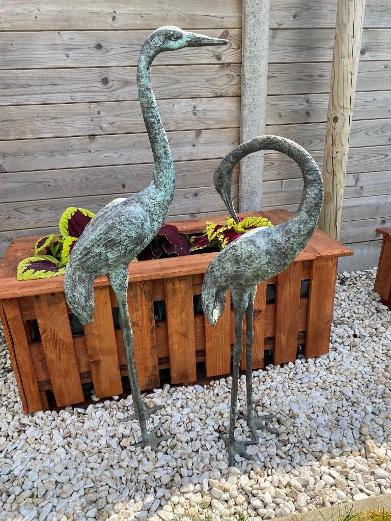 bronzen kraanvogels, Ophalen