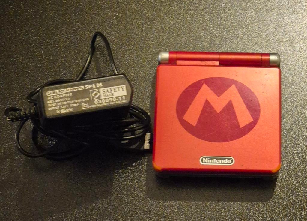 Nintendo Game Boy Advance SP Mario editie + lader – werkend, Ophalen of Verzenden, Gebruikt, Game Boy Advance