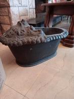 Bac à charbon ou à bois de chauffage en fonte, Enlèvement