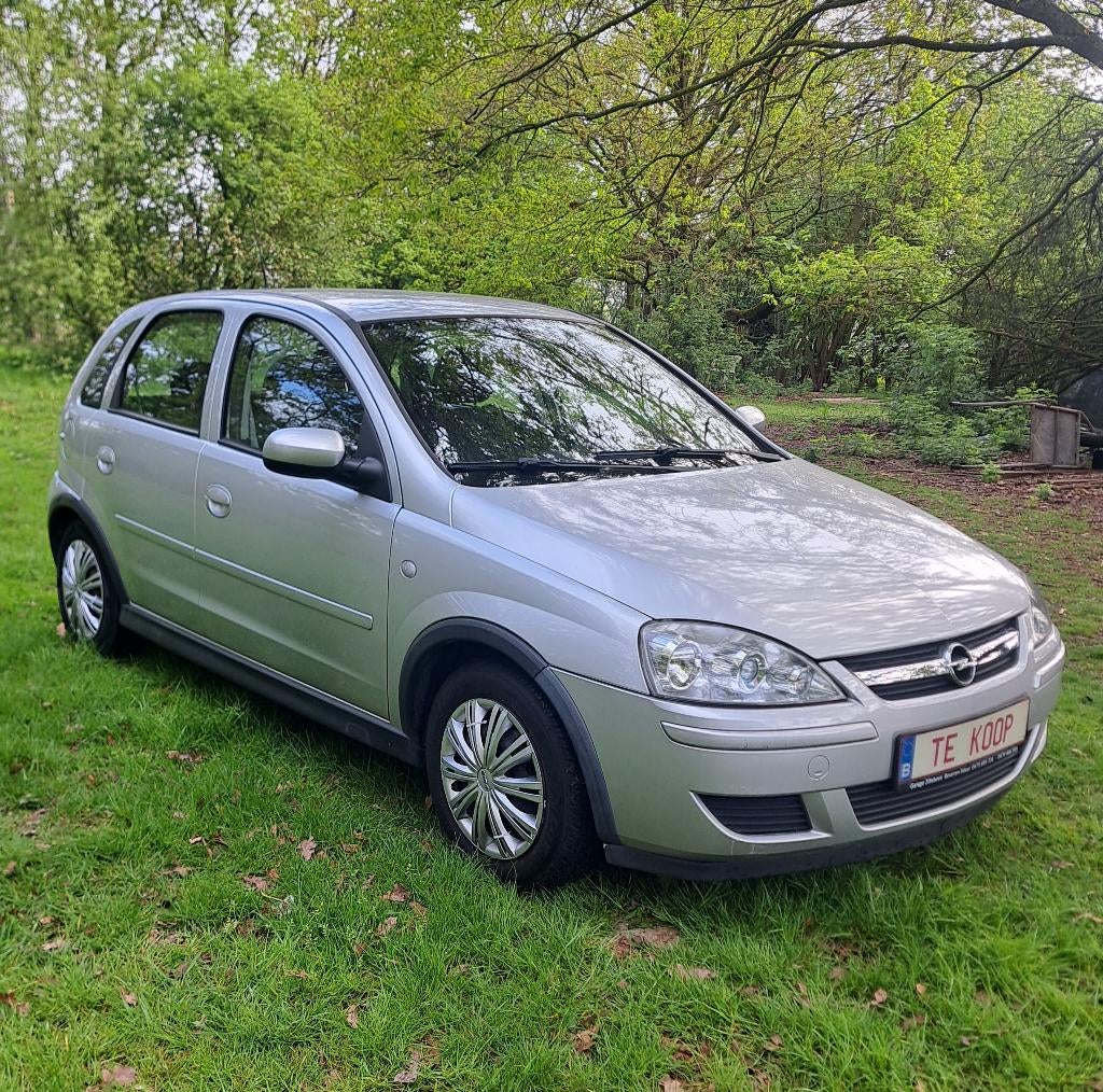 Opel Corsa: 102.000km + airco +jaar garantie +groot nazicht!, Auto's, Voorwielaandrijving, Stof, 129 g/km, 4 cilinders