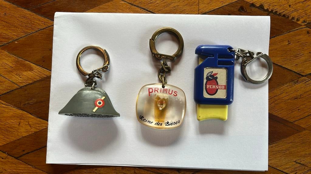 Lot de 3 porte-clés courvoisier - primus - pernod, Enlèvement ou Envoi, Comme neuf