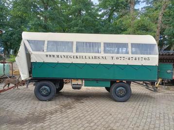 Huifkar voor 20 personen. beschikbaar voor biedingen